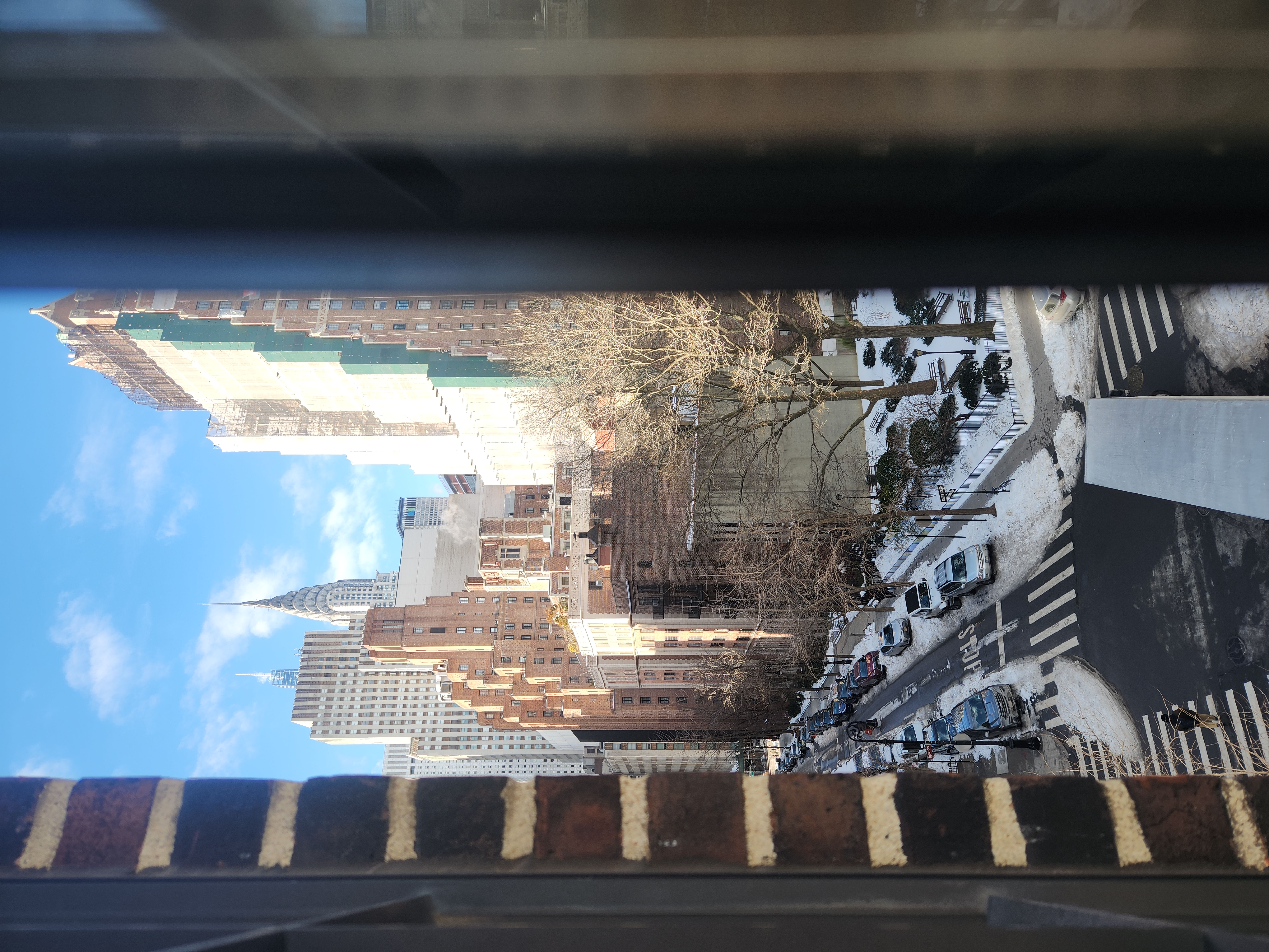 5 Tudor City Place, Unit 602 Manhattan, NY 10017 - Photo 1 of 20 a view of a balcony with wooden floor