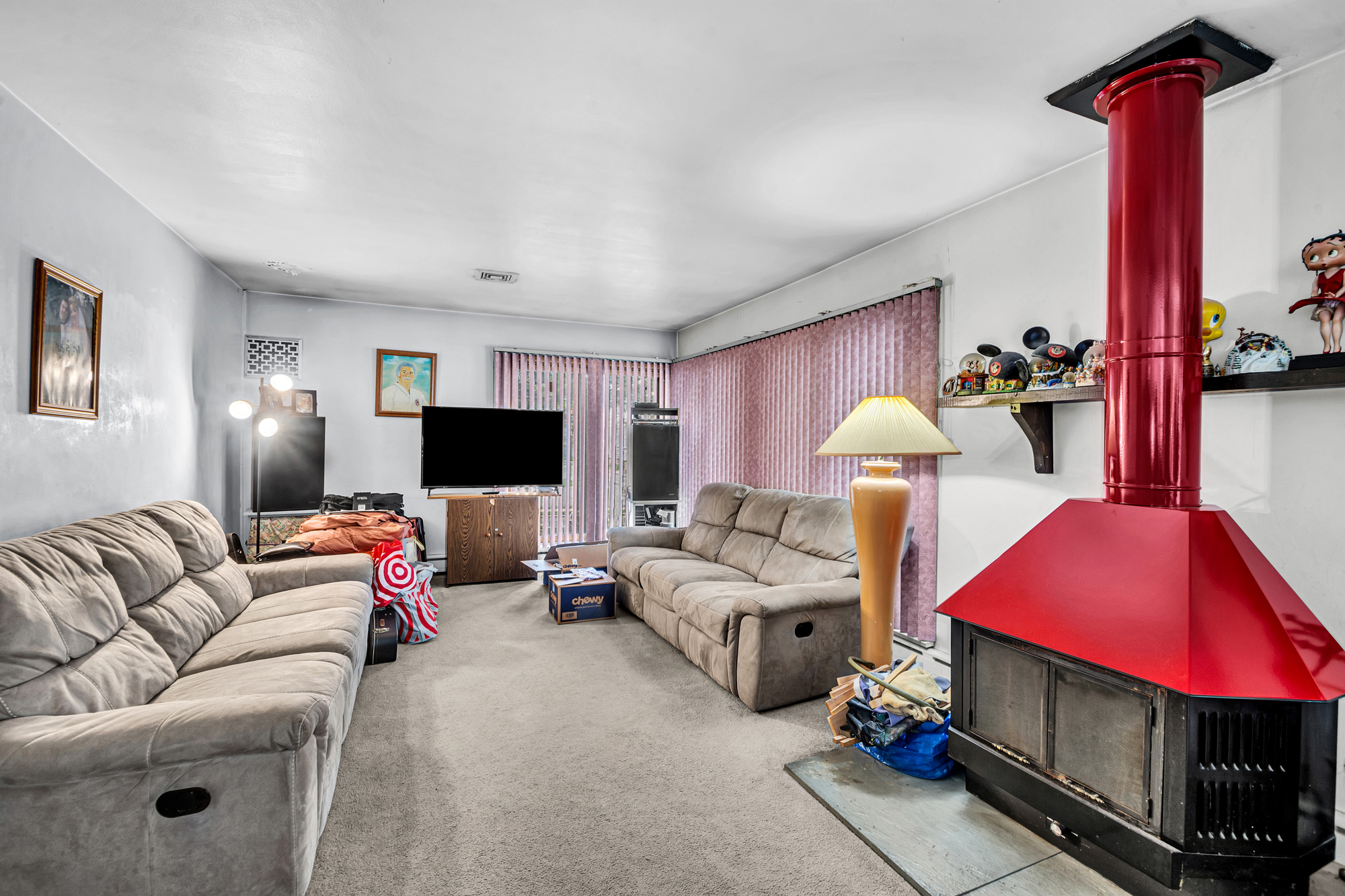 2 Livingston Court Staten Island, NY 10310 - Photo 3 of 14 a living room with furniture and a flat screen tv