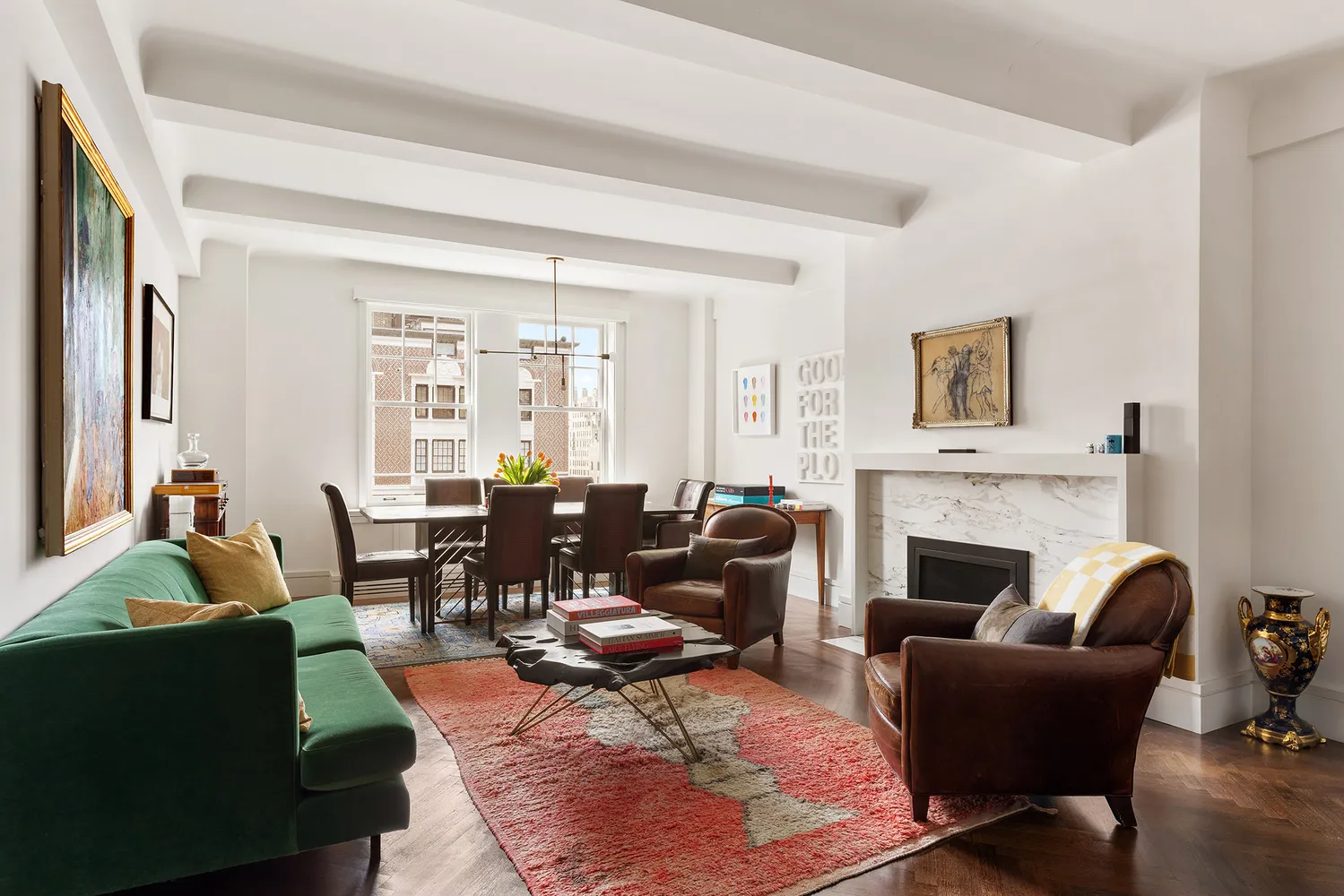 a living room with furniture couches and a fireplace
