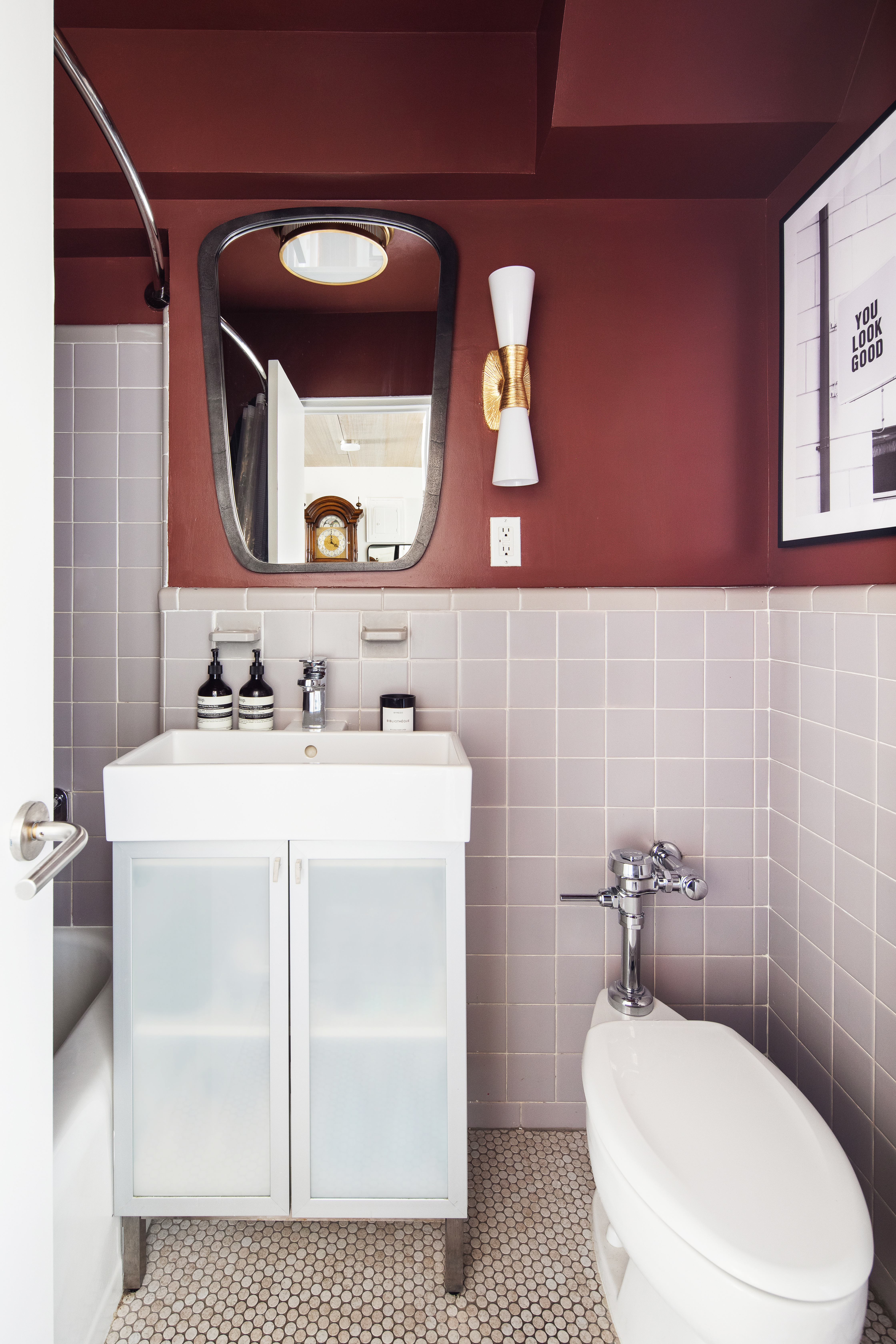 69 West 9th Street, Unit 11CDE Manhattan, NY 10011 - Photo 8 of 9 a bathroom with a sink toilet and mirror