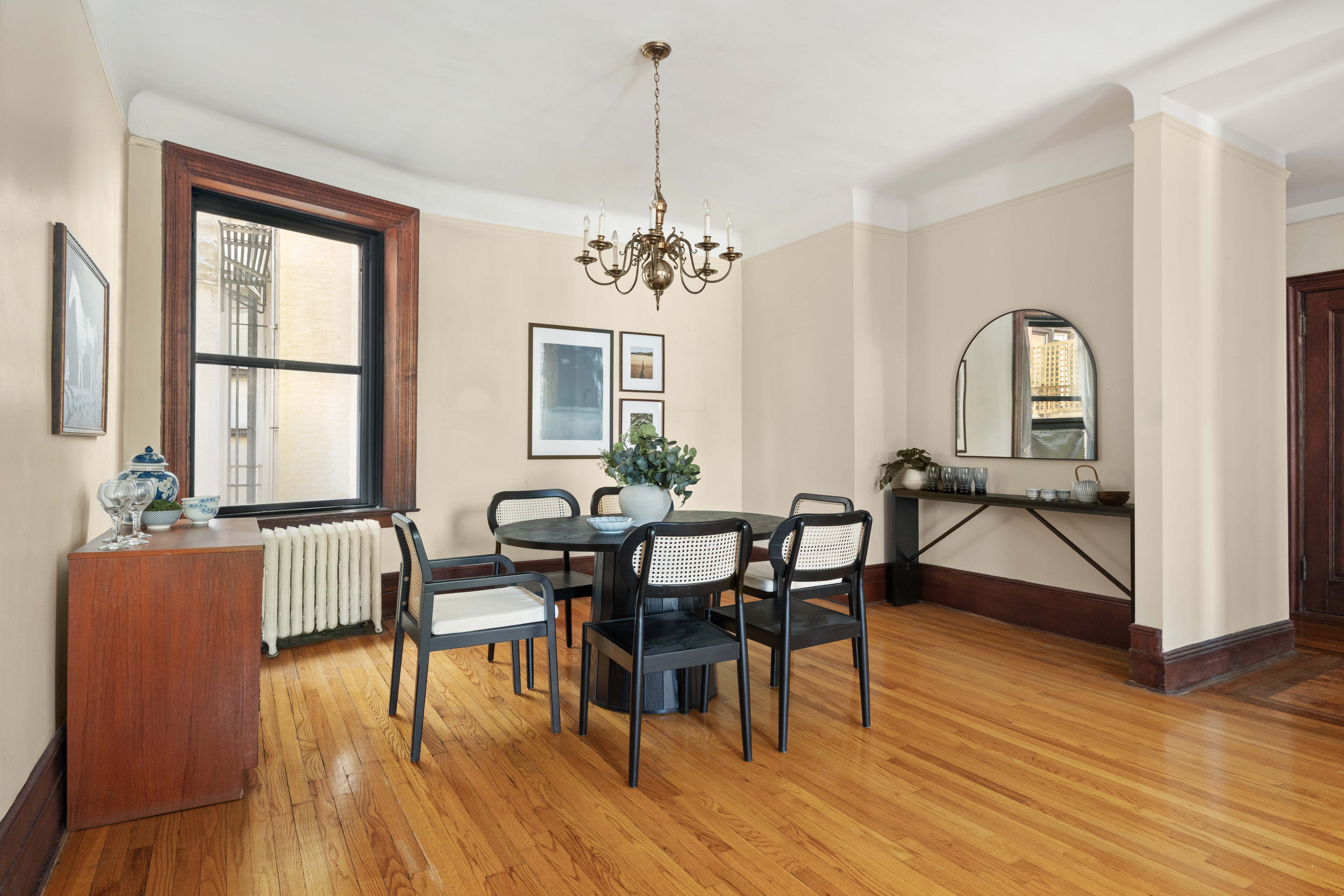 61 Pierrepont Street, Unit 24 Brooklyn, NY 11201 - Photo 4 of 11 a view of a a dining room with furniture window and wooden floor