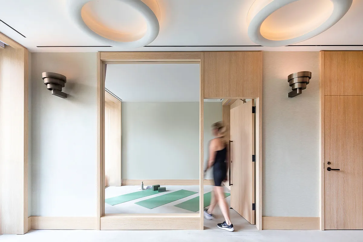 249 East 62nd Street, Unit 10B Manhattan, NY 10065 - Photo 14 of 21 a view of a room with gym equipment