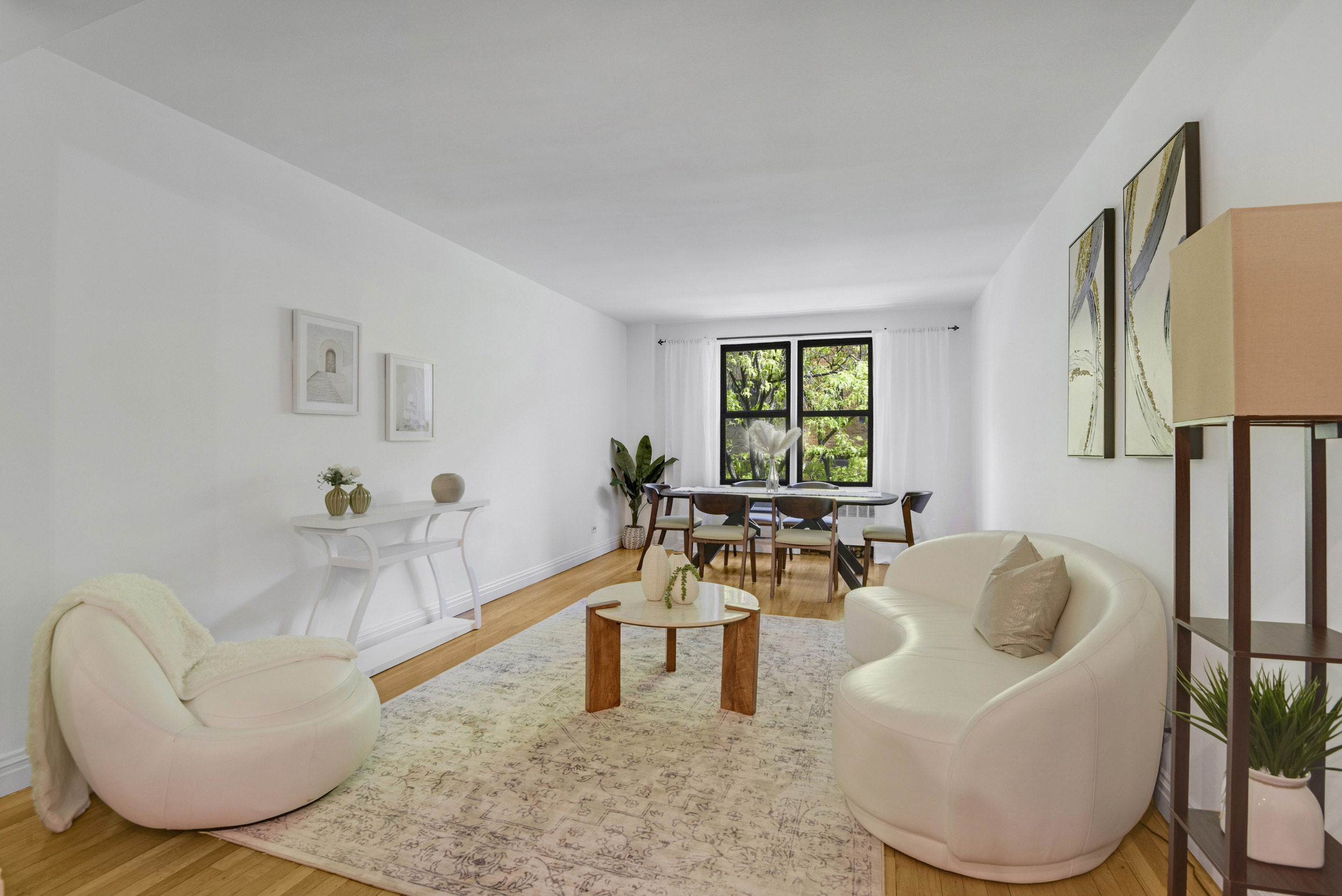 330 East 70th Street, Unit 4F Manhattan, NY 10021 - Photo 3 of 14 a living room with furniture and a window