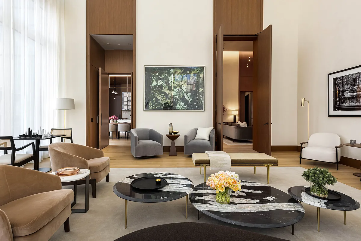 15 East 30th Street, Unit Undisclosed Manhattan, NY 10016 - Photo 18 of 23 a living room with furniture and a potted plant