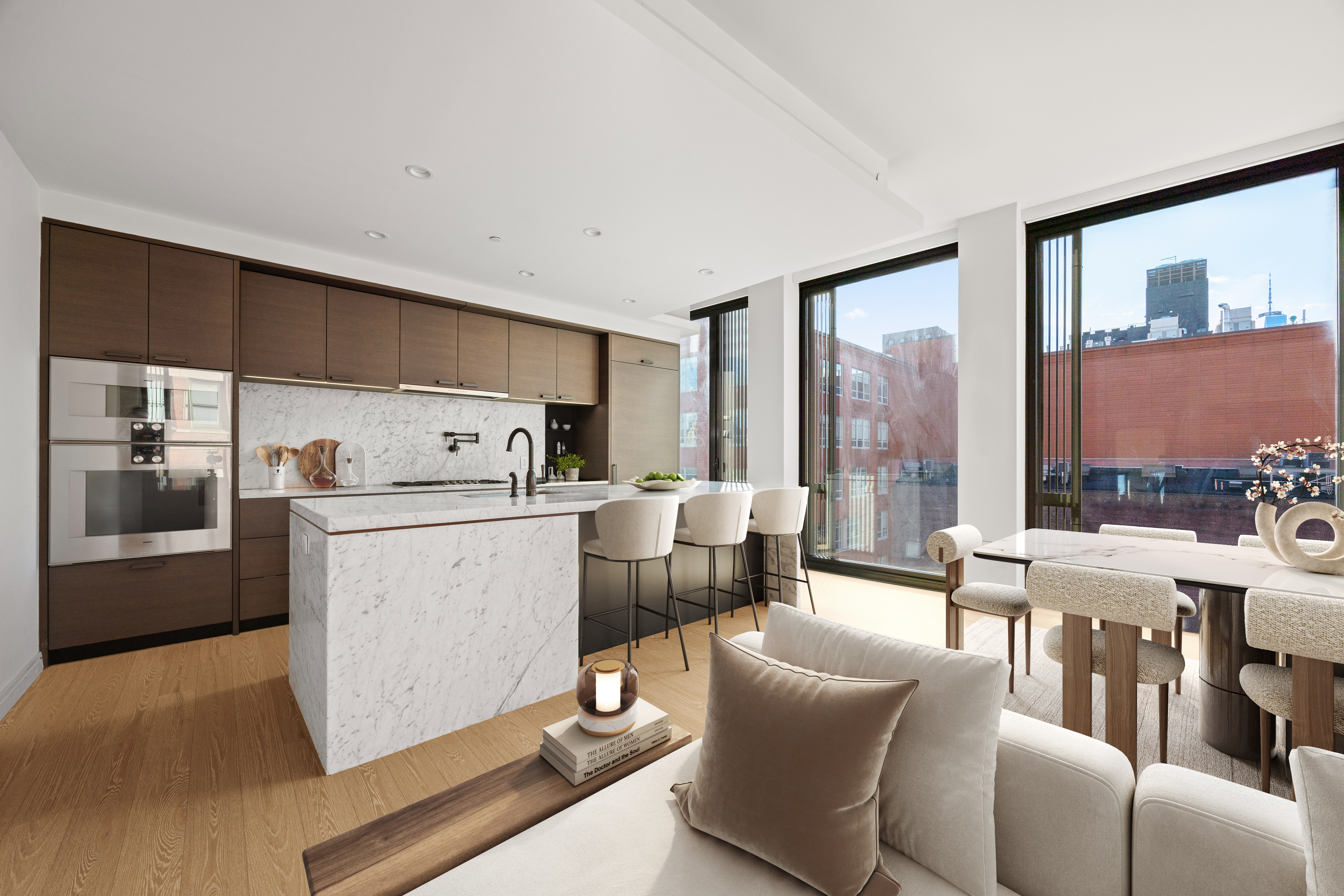 100 Barrow Street, Unit 9A Manhattan, NY 10014 - Photo 4 of 12 a view of kitchen and living room with furniture