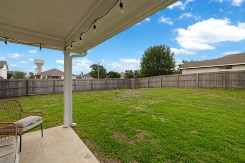 a view of a backyard with a garden