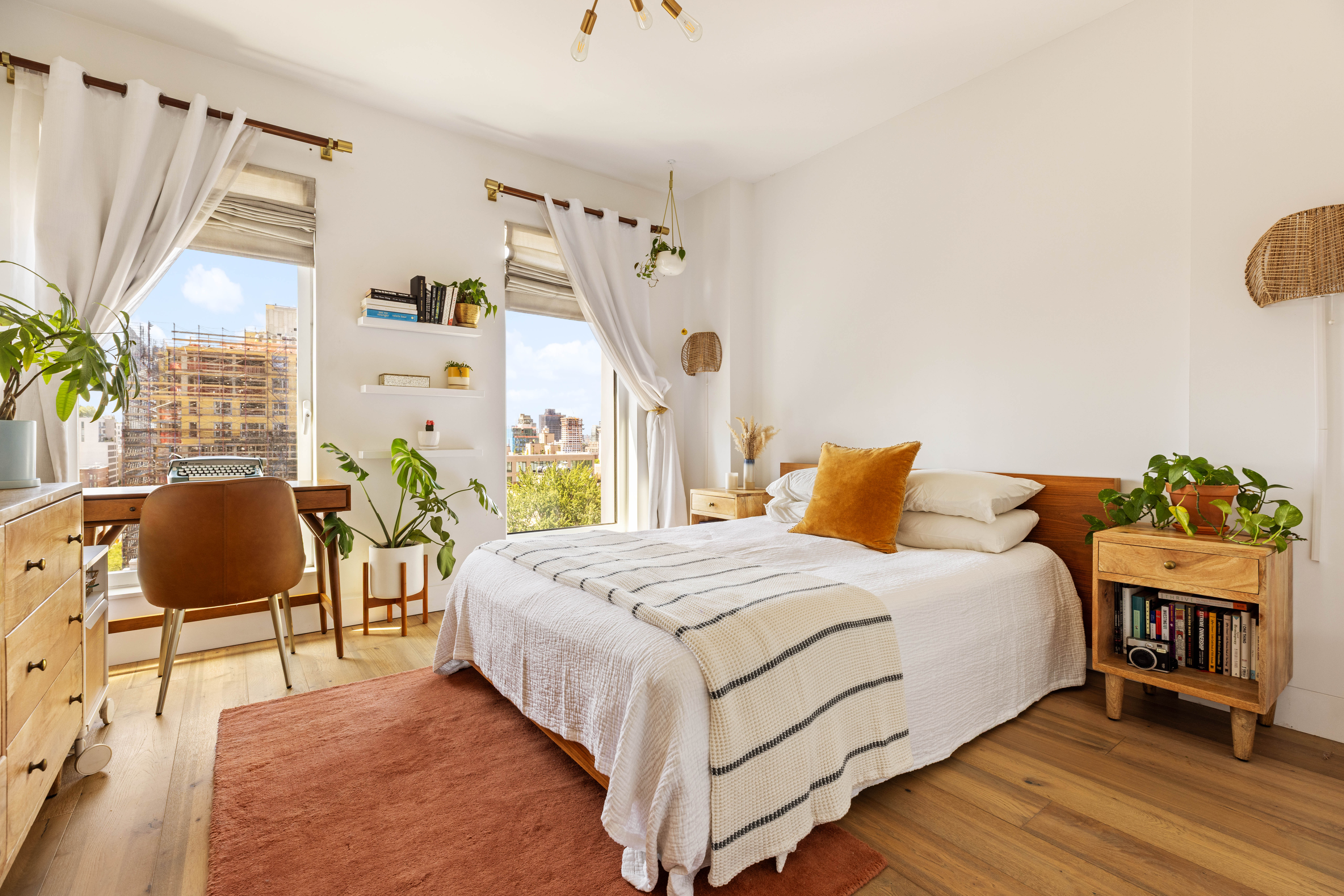 561 Pacific Street, Unit 803 Brooklyn, NY 11217 - Photo 5 of 16 a bedroom with a bed and wooden floor