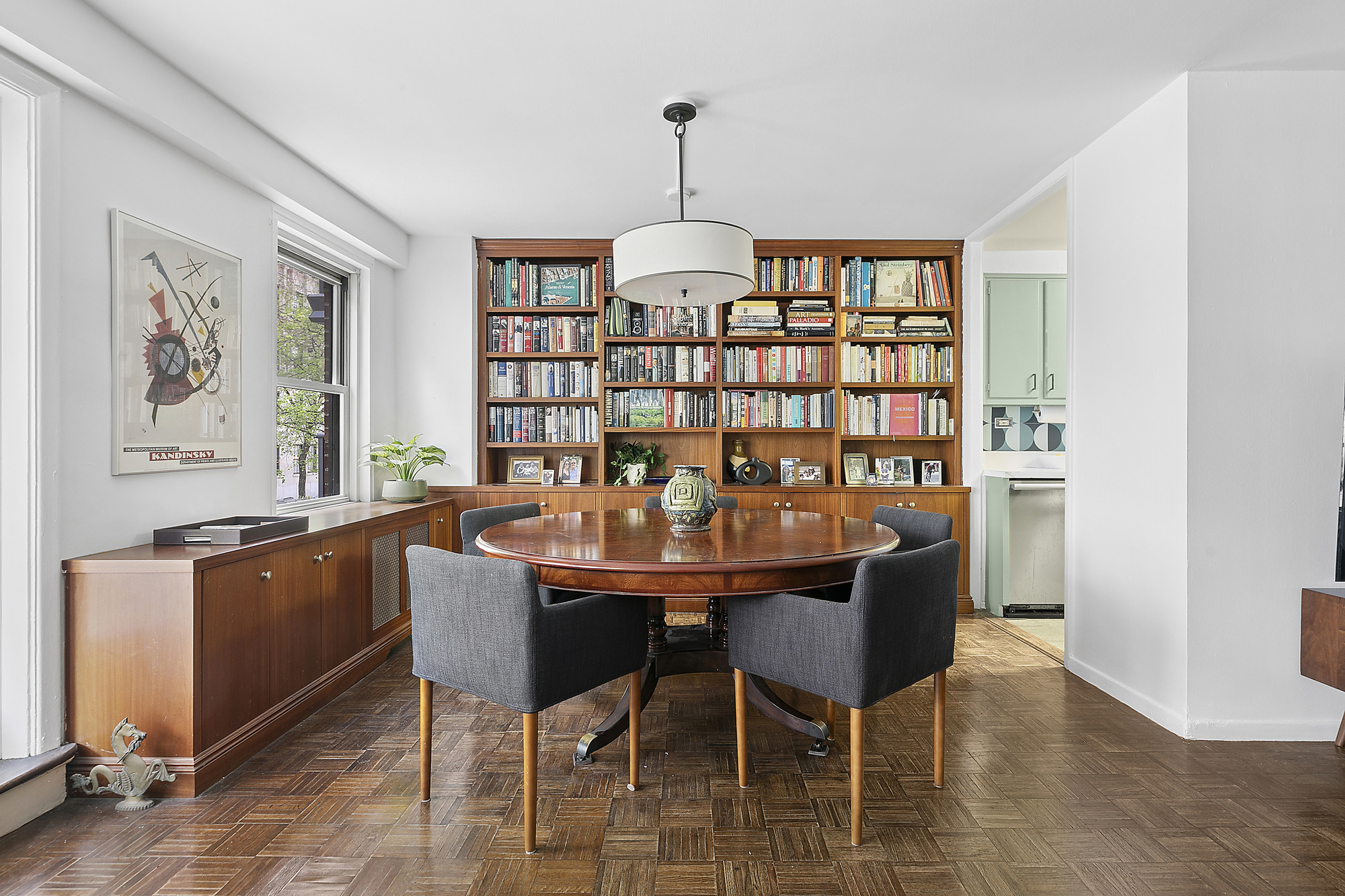 1199 Park Avenue, Unit 2F Manhattan, NY 10128 - Photo 4 of 12 a dining room with furniture and window