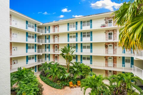 a front view of a multi story residential apartment building