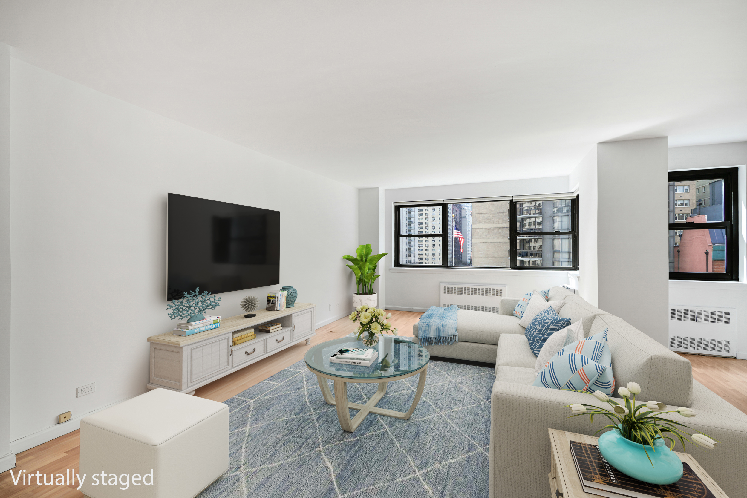 357 East 57th Street, Unit 5D Manhattan, NY 10022 - Photo 22 of 23 a living room with furniture a flat screen tv and a window