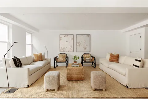 a living room with furniture and a couch