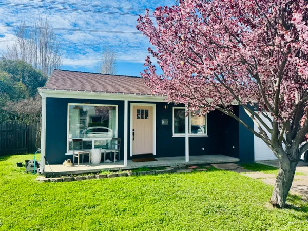 front view of a house with a yard