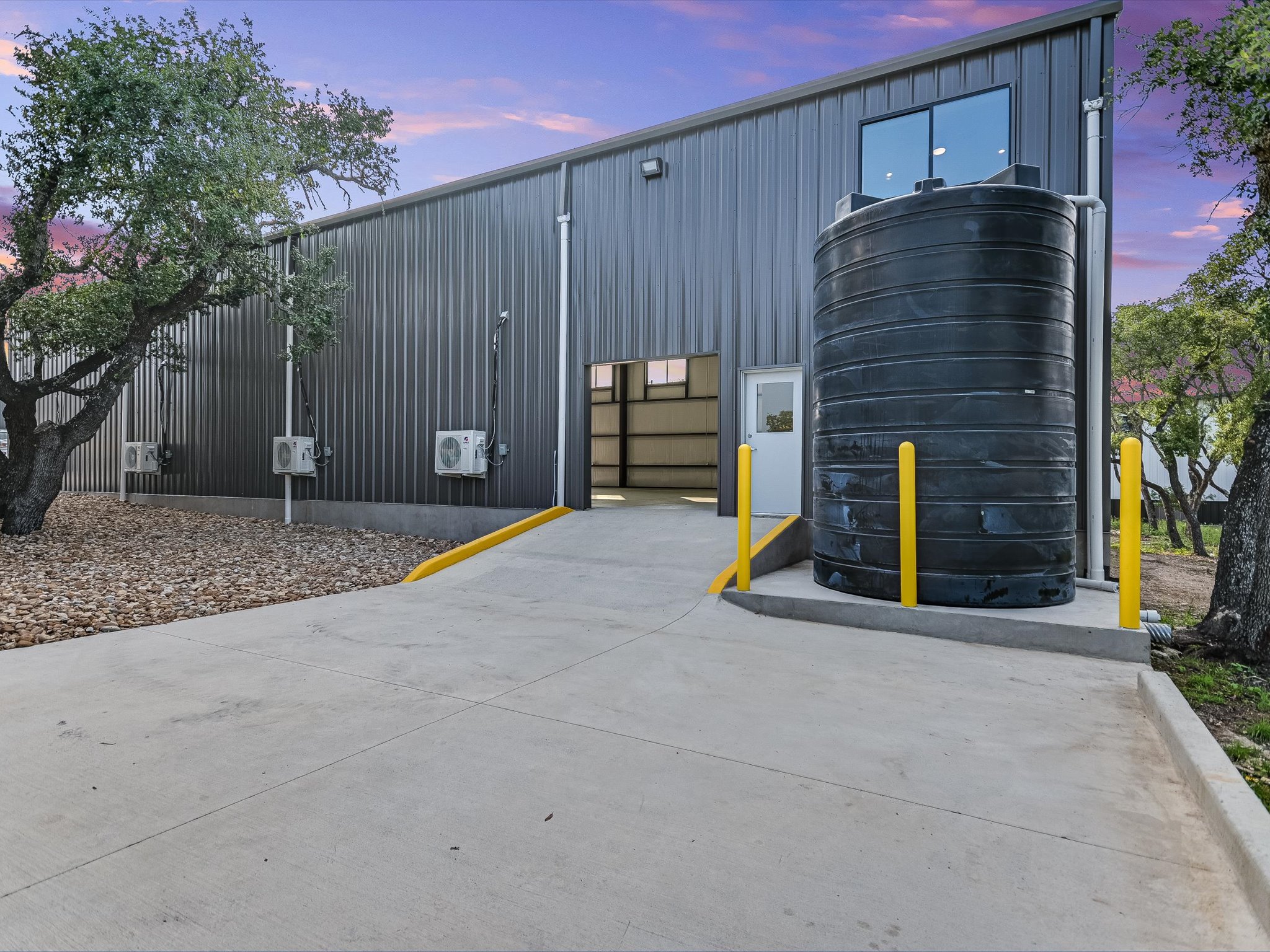 15210 Fitzhugh Road, Unit 800 Austin, TX 78736 - Photo 6 of 18 a view of backyard with tub and trees in the background