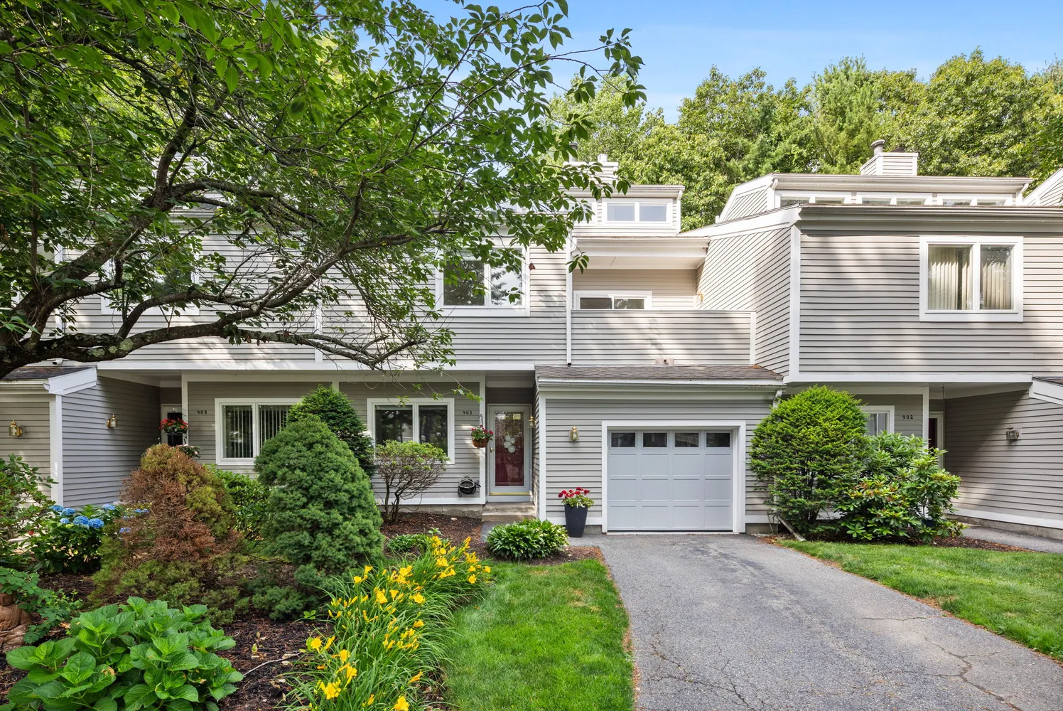 front view of a house with a yard