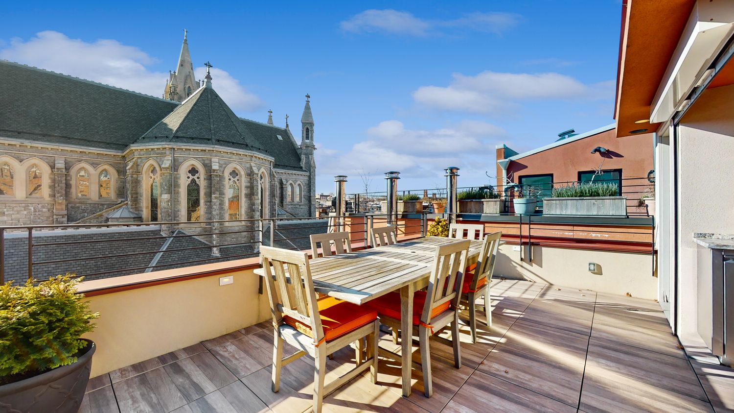 a kitchen with stainless steel appliances granite countertop sink stove and refrigerator