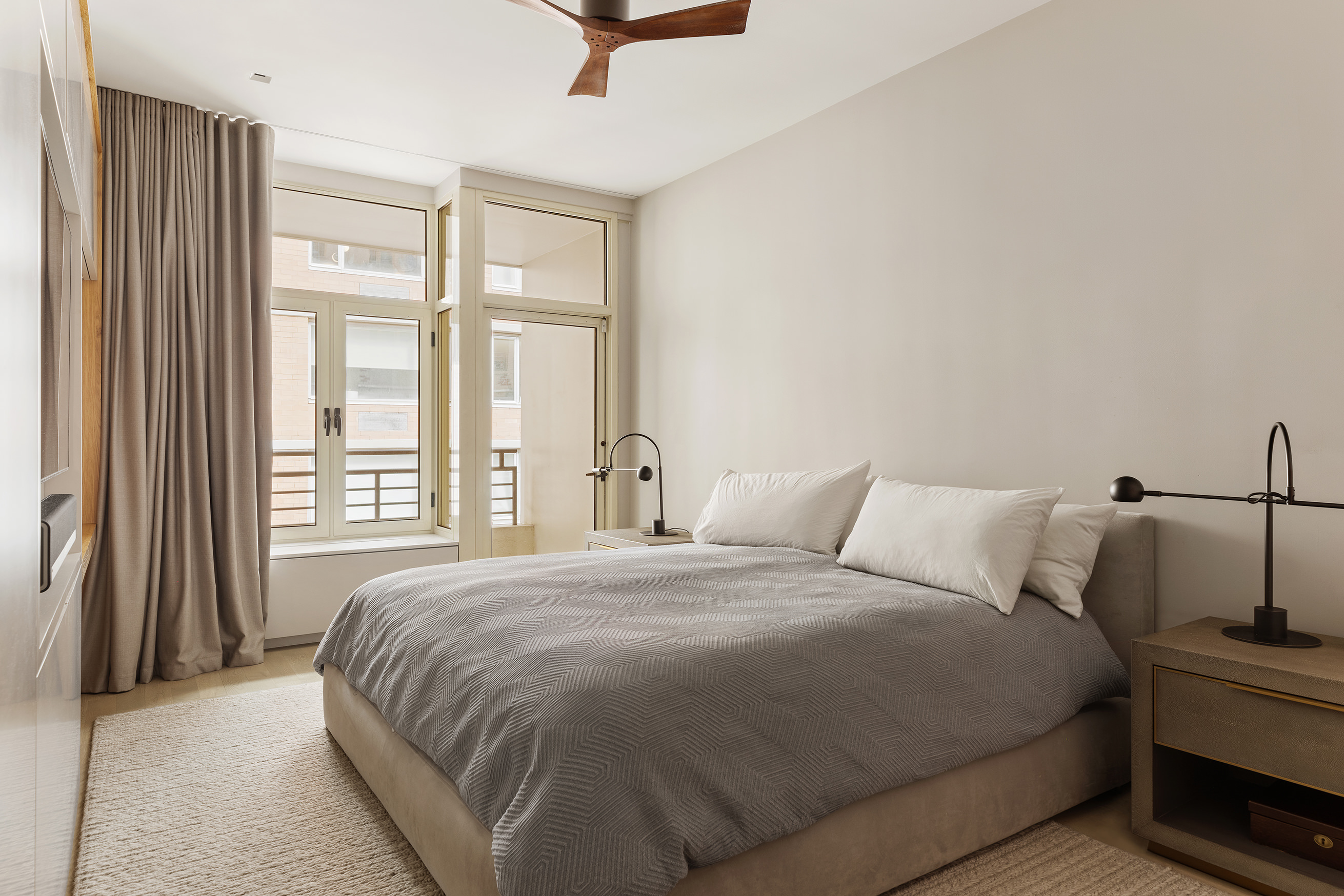 129 West 20th Street, Unit 4B Manhattan, NY 10011 - Photo 8 of 16 a bedroom with a bed and window