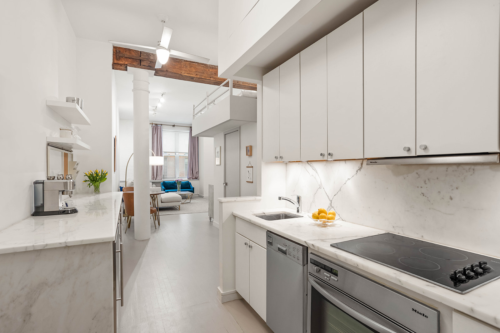 23 Waverly Place, Unit 3Y Manhattan, NY 10003 - Photo 4 of 12 a kitchen with a sink and cabinets