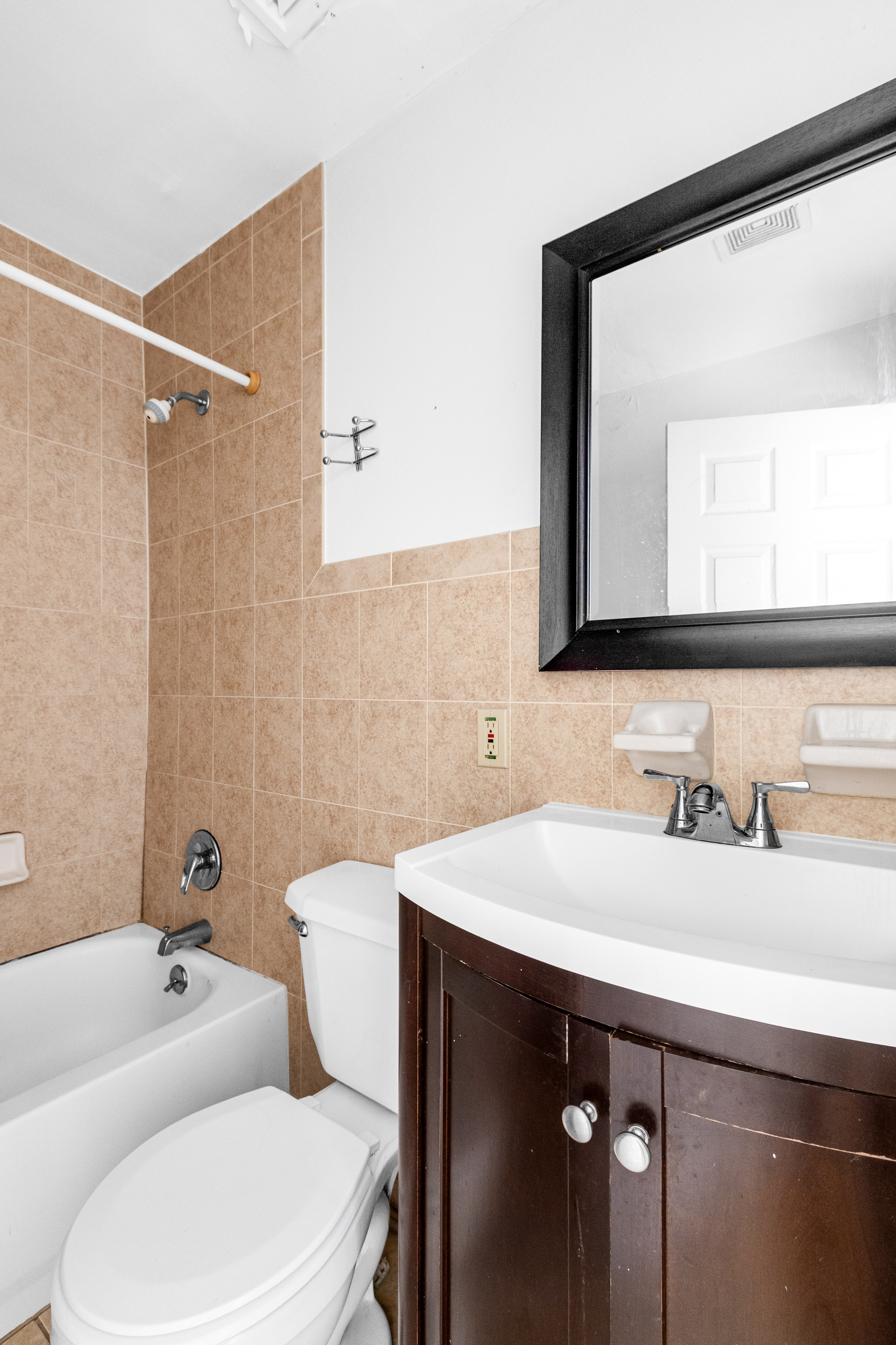 103 A Patchen Avenue Brooklyn, NY 11221 - Photo 13 of 19 a bathroom with a sink and a mirror