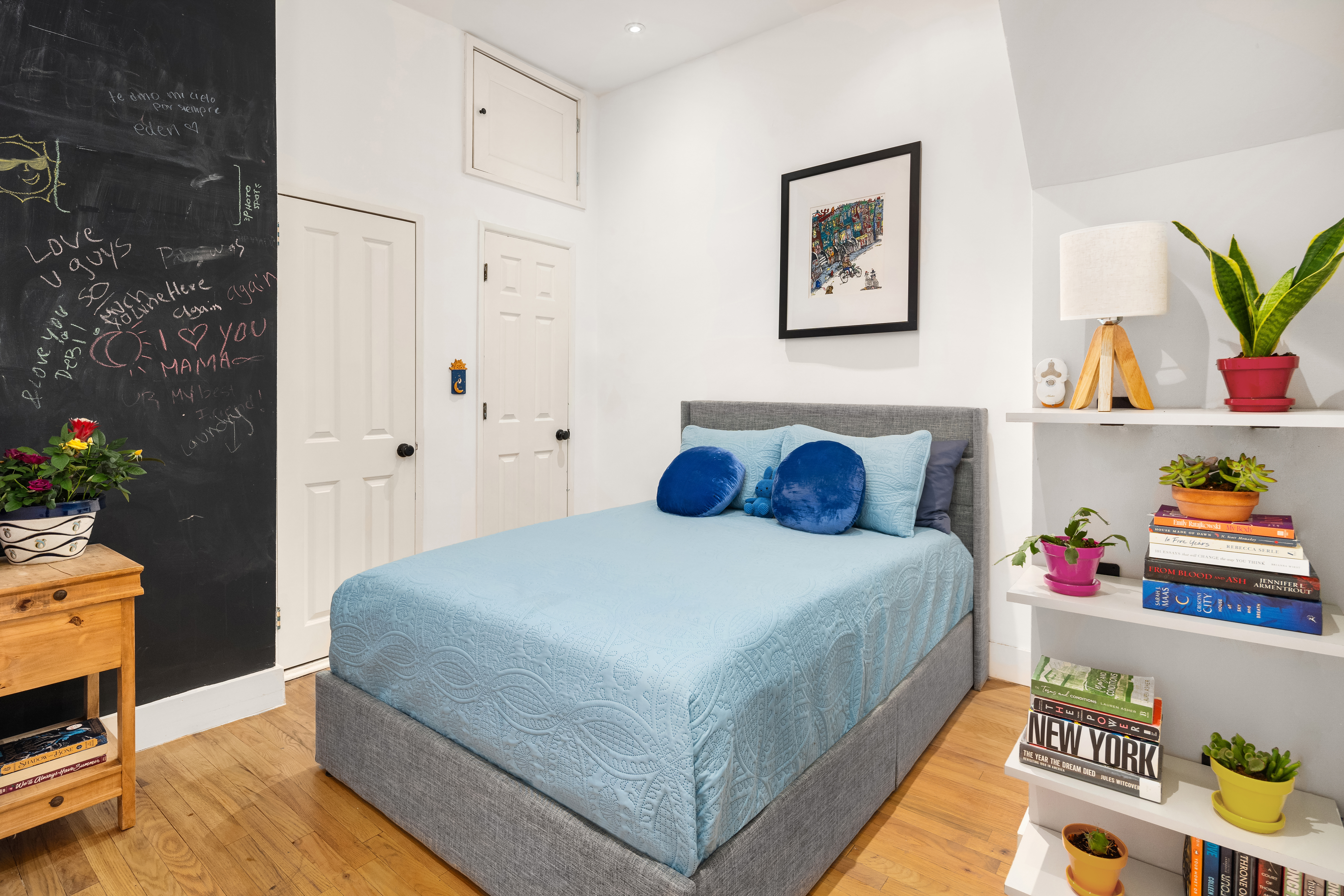 92 Horatio Street, Unit 1J Manhattan, NY 10014 - Photo 6 of 16 a bedroom with a bed and a window