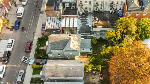 a bird view of building and yard