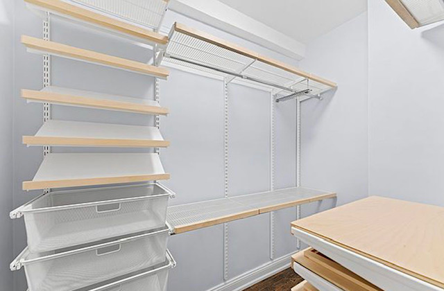465 West 23rd Street, Unit 2G Manhattan, NY 10011 - Photo 7 of 11 a view of a room with rack on the wall