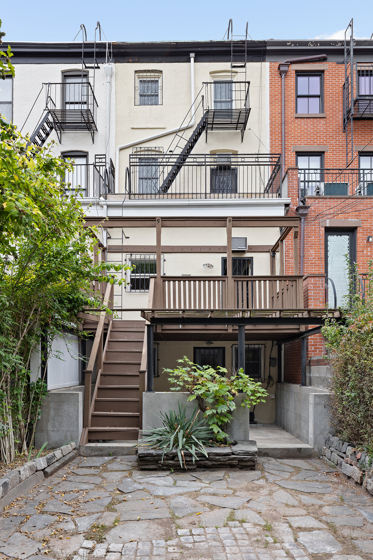115 A 2nd Place Brooklyn, NY 11231 - Photo 26 of 27 a front view of a house with garden