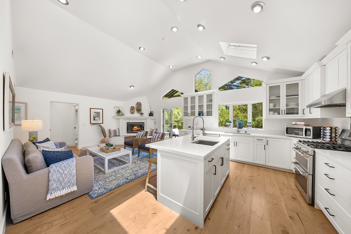 161 Loureyro Road Montecito, CA 93108 - Photo 9 of 52 a large kitchen with stainless steel appliances lots of white cabinets and wooden floor