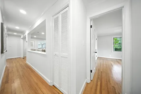 a bedroom with a bed and lamp