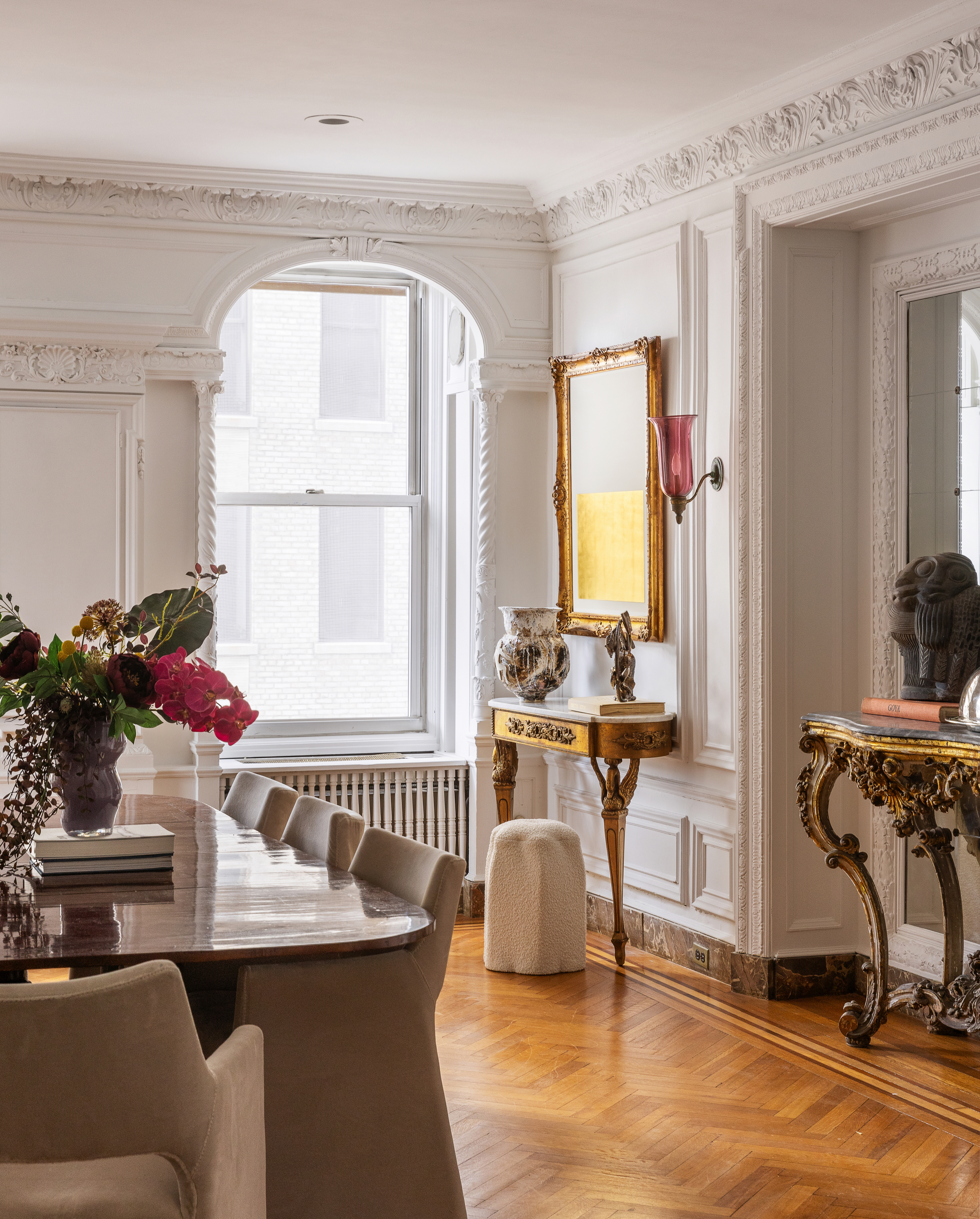 1136 5th Avenue, Unit 6A Manhattan, NY 10128 - Photo 20 of 44 a dining room with a table and chairs