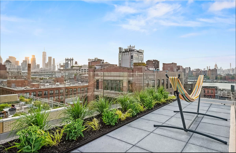 218 Front Street, Unit 231 Brooklyn, NY 11201 - Photo 31 of 35 a view of a city with tall buildings and a bench