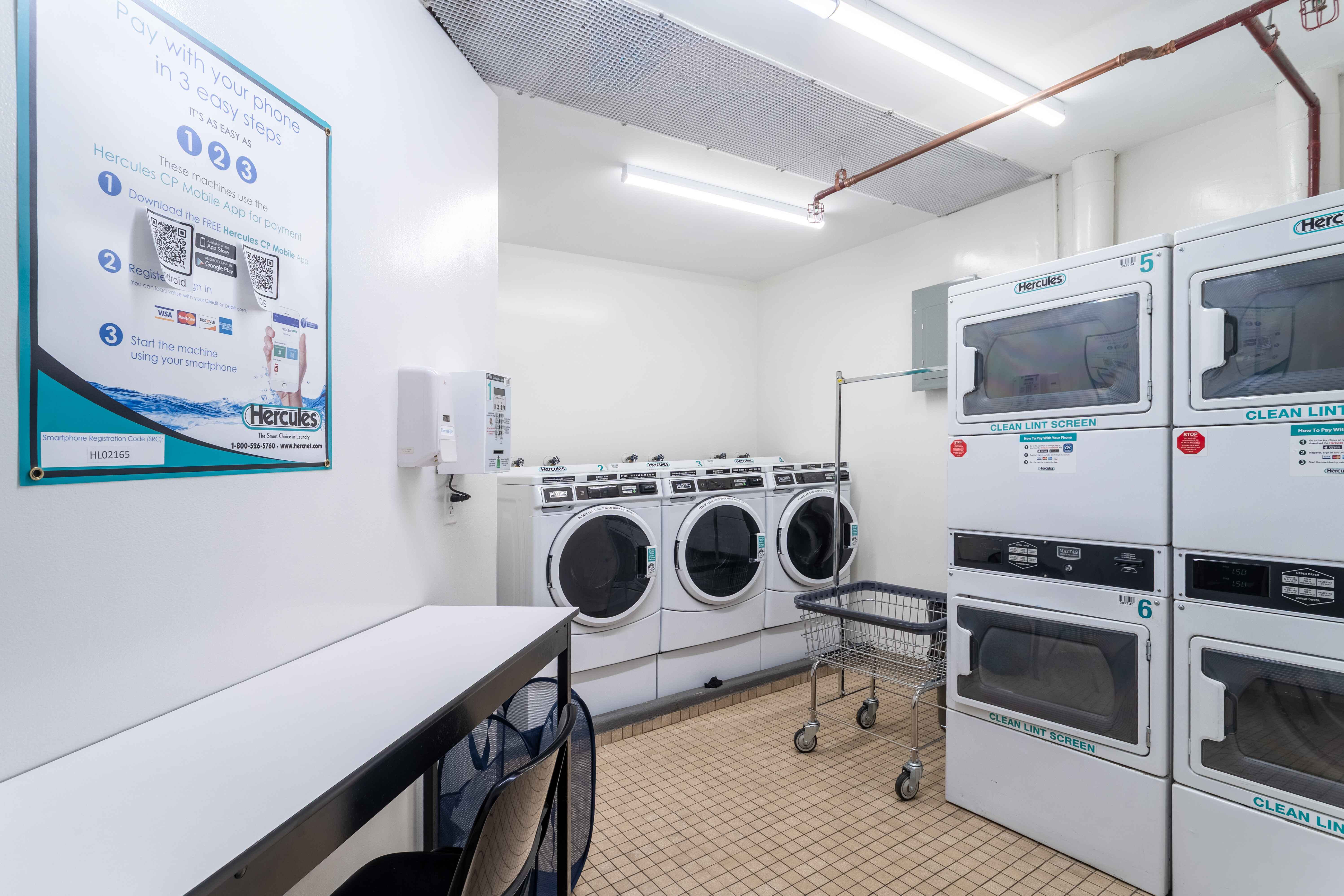 250 West 88th Street, Unit 408 Manhattan, NY 10024 - Photo 9 of 10 a utility room with dryer and washer