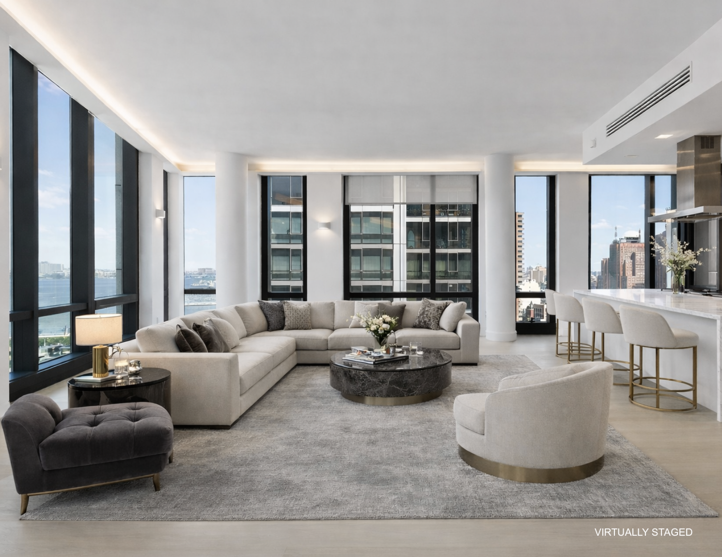 a living room with furniture and large windows