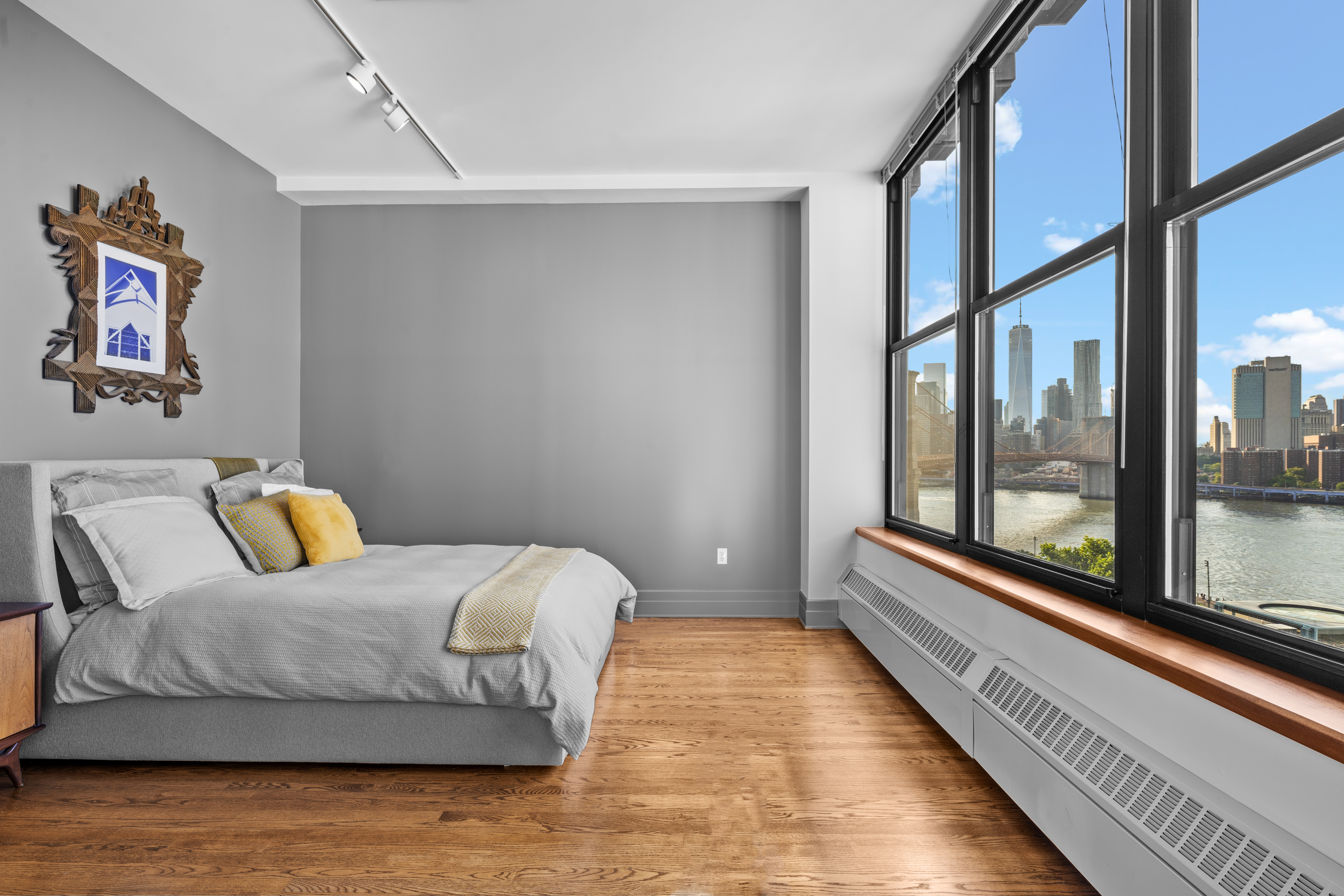 30 Main Street, Unit PHB Brooklyn, NY 11201 - Photo 11 of 33 a bedroom with a bed and glass door
