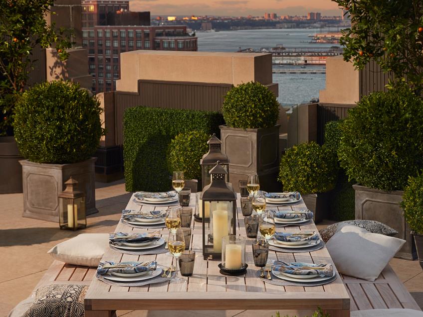100 Barclay Street, Unit 13P Manhattan, NY 10007 - Photo 12 of 21 a view of a patio with couches table and chairs and potted plants