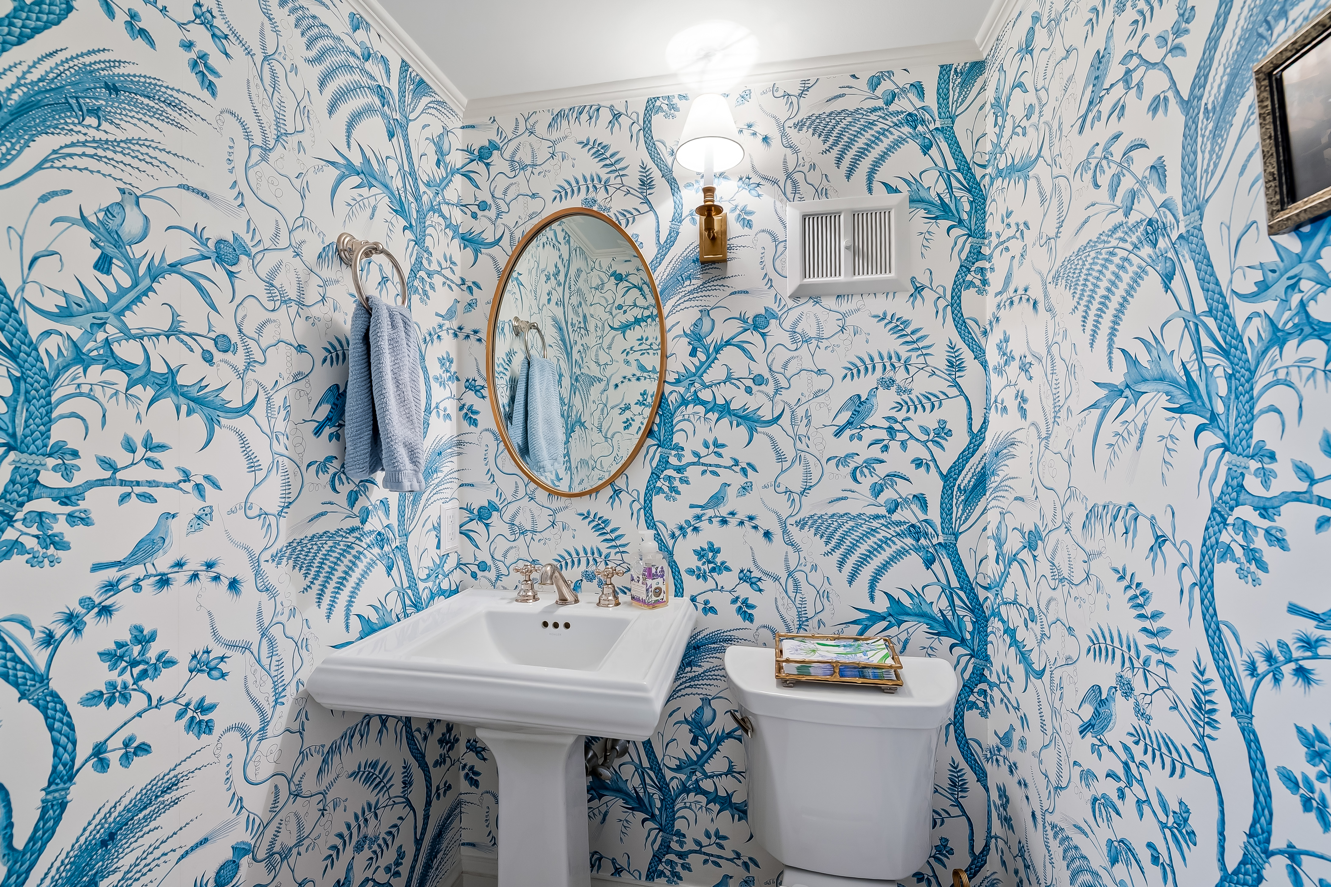 6 Elmhurst Road Baltimore, MD 21210 - Photo 55 of 100 a bathroom with a sink and mirror with painted walls