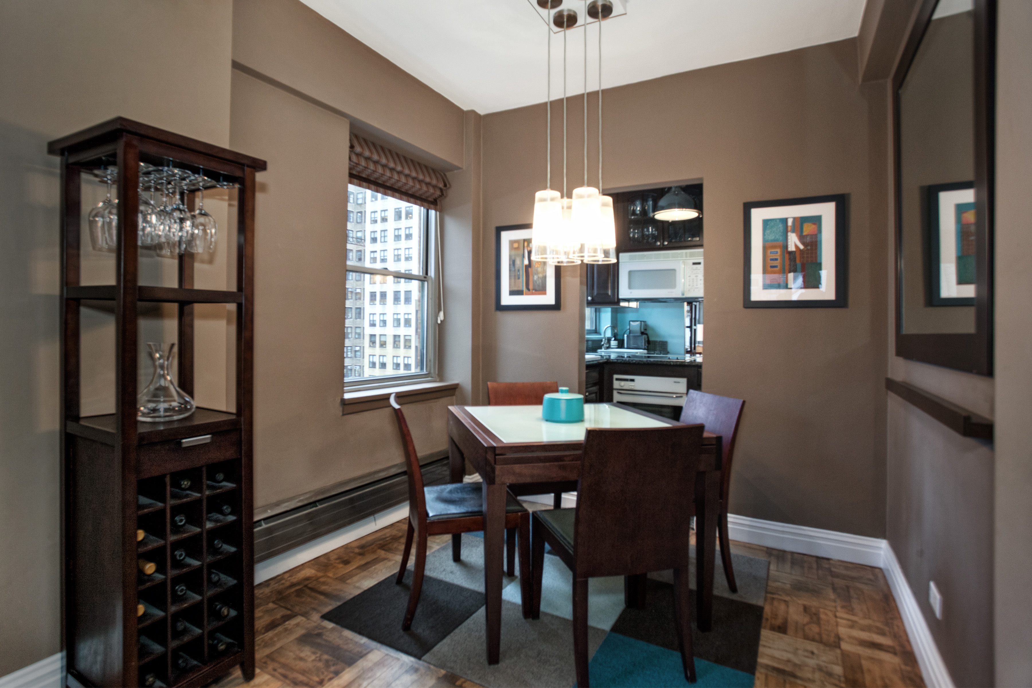 80 Park Avenue, Unit 17B Manhattan, NY 10016 - Photo 3 of 10 a view of a dining room with furniture and window