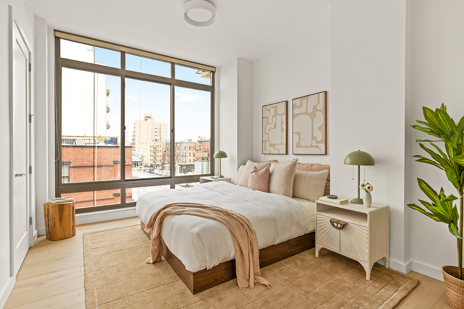 500 4th Avenue, Unit 4D Brooklyn, NY 11215 - Photo 4 of 11 a spacious bedroom with a bed and a large window