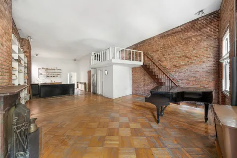 a view of livingroom with furniture and fireplace