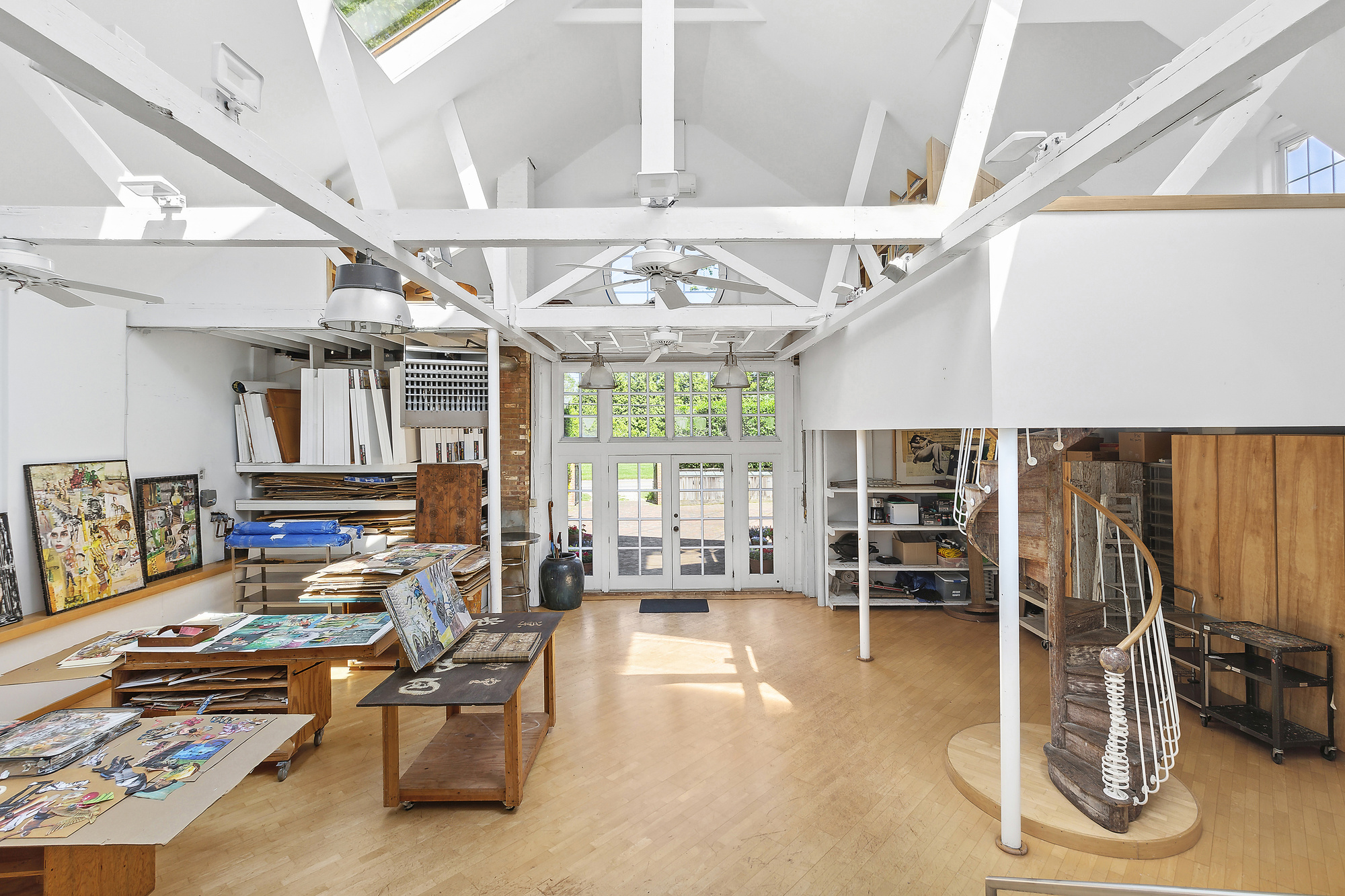 488 Ocean Road Bridgehampton, NY 11932 - Photo 5 of 21 a living room with lots of furniture and a chandelier