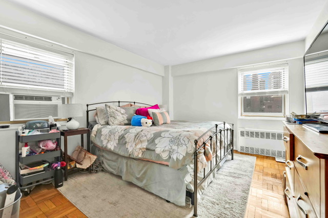 135 Ashland Place, Unit 5A Brooklyn, NY 11201 - Photo 7 of 12 a bedroom with a bed and a window