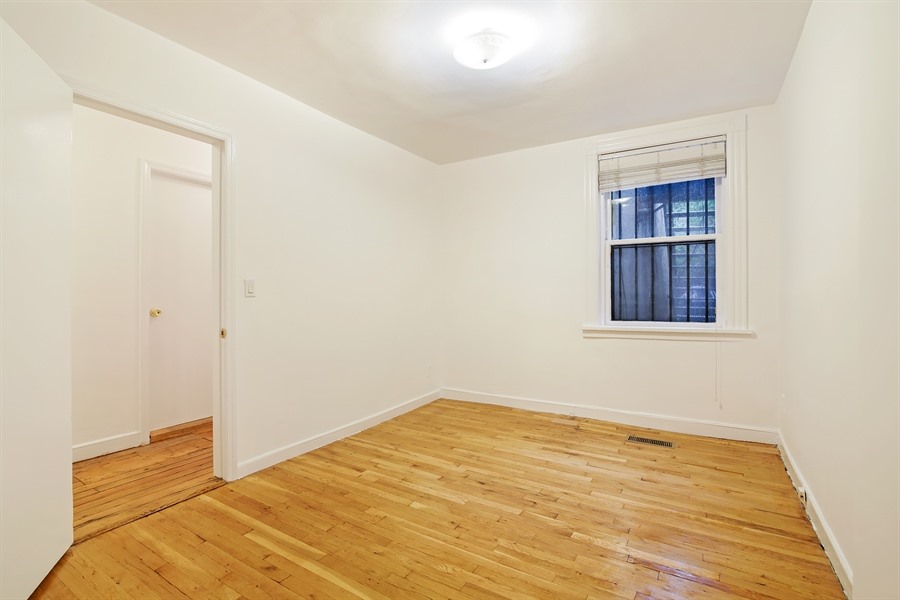 553 2nd Street, Unit 1 Brooklyn, NY 11215 - Photo 9 of 11 a view of empty room with wooden floor and fan