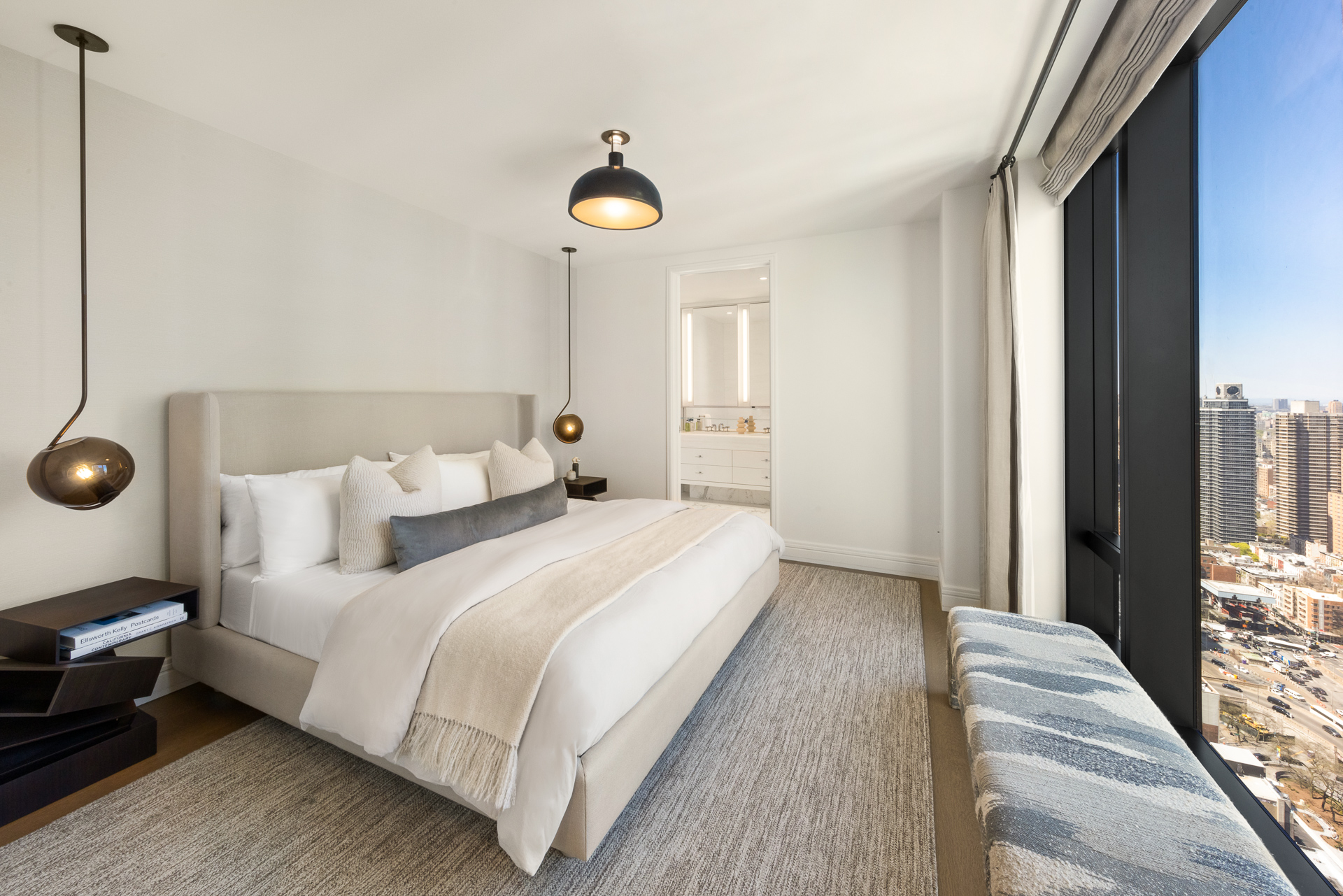 430 East 58th Street, Unit 38A Manhattan, NY 10022 - Photo 7 of 22 a bedroom with a bed and a window