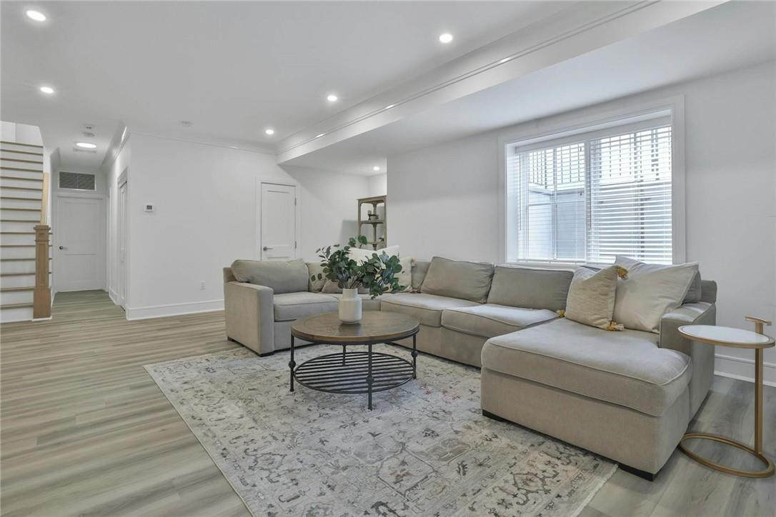 211 Purchase Street, Unit A Rye, NY 10580 - Photo 17 of 22 a living room with furniture and a large window