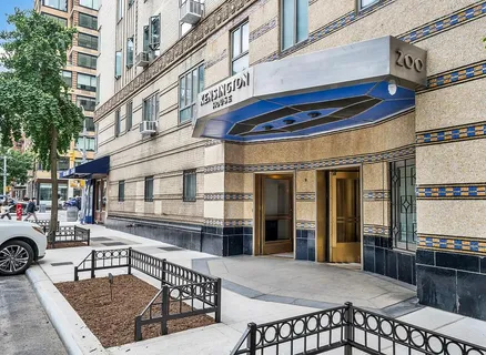 a view of a building with sitting area