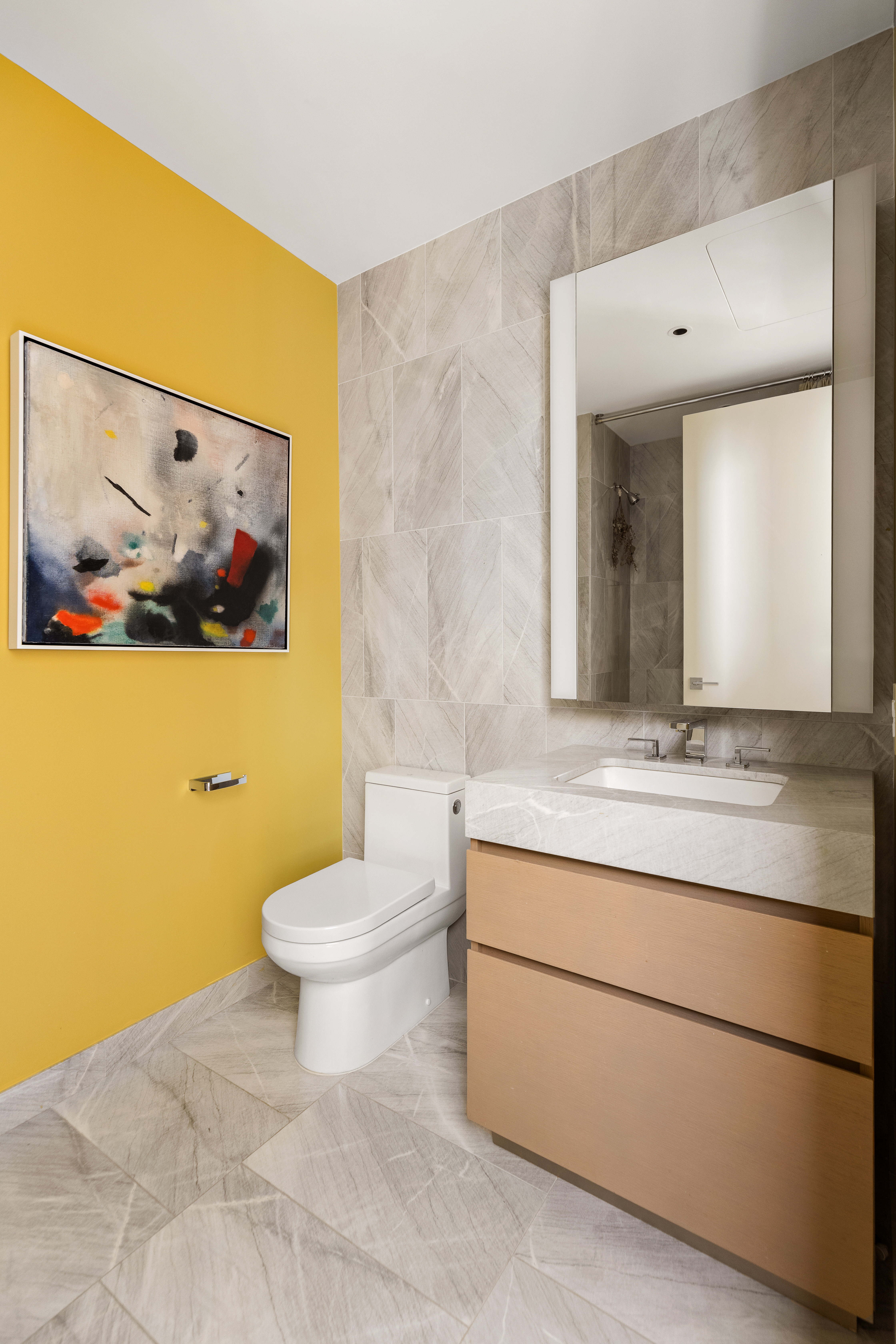 15 Hudson Yards, Unit PH83D Manhattan, NY 10001 - Photo 12 of 20 a bathroom with a granite countertop sink mirror and toilet