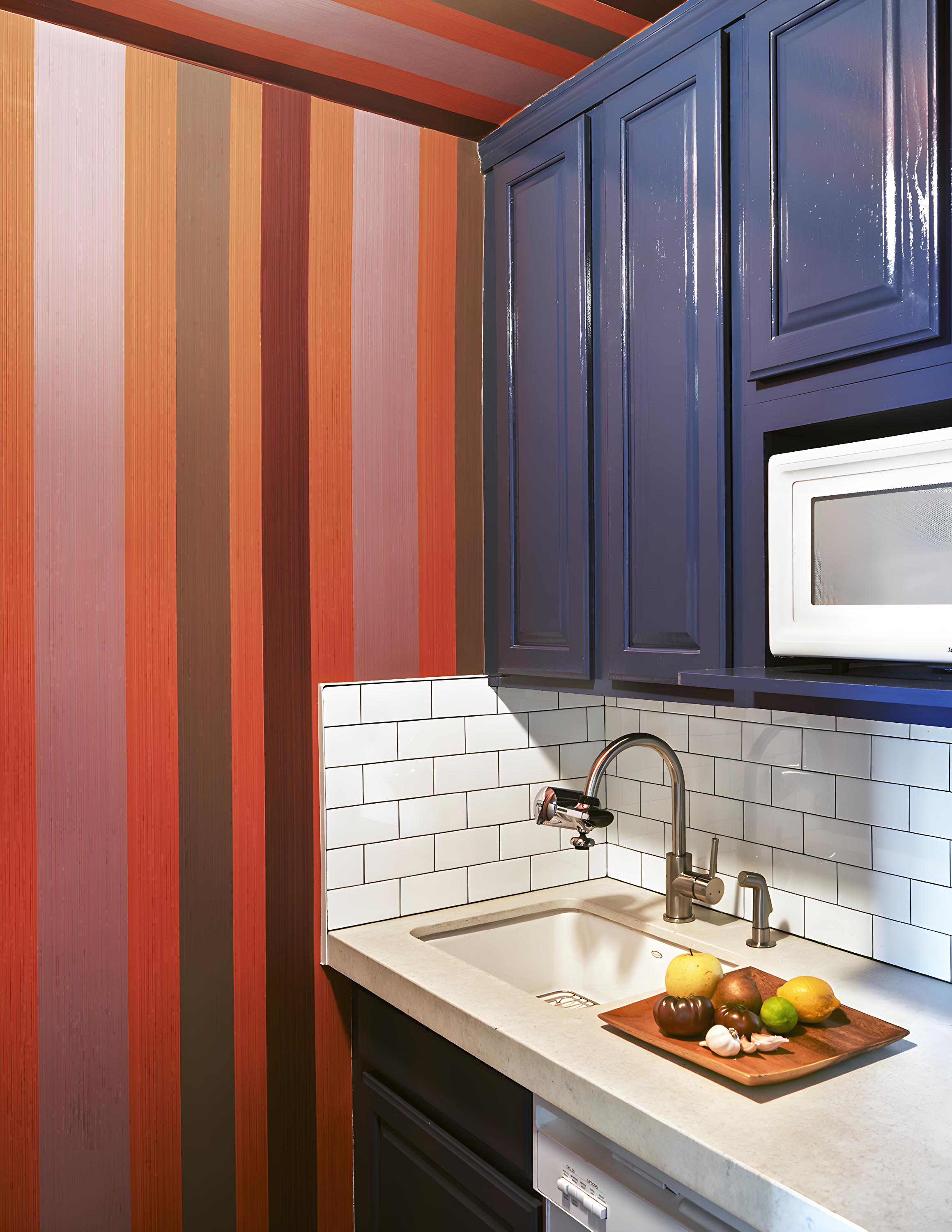 101 West 12th Street, Unit 15P Manhattan, NY 10011 - Photo 7 of 16 a kitchen with a sink and cabinets