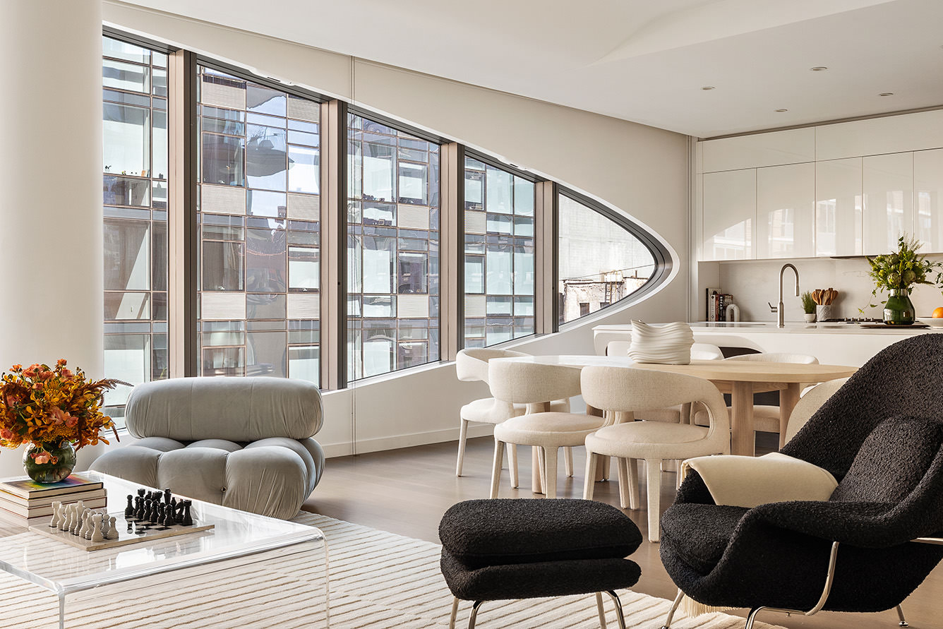 520 West 28th Street, Unit 18 Manhattan, NY 10001 - Photo 2 of 21 a living room with furniture and a large window