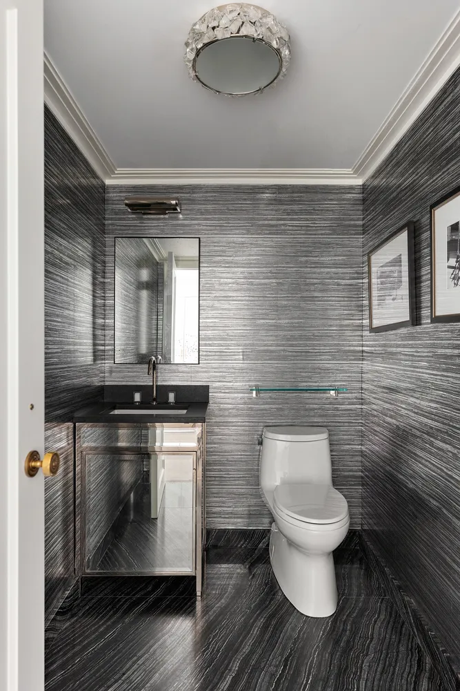 a view of a livingroom with furniture and a window