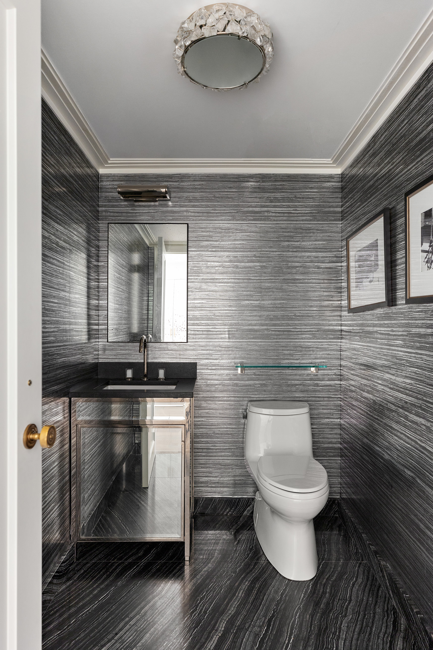 135 West 77th Street Manhattan, NY 10024 - Photo 30 of 32 a bathroom with a toilet and a mirror