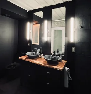 a view of a back yard from a balcony